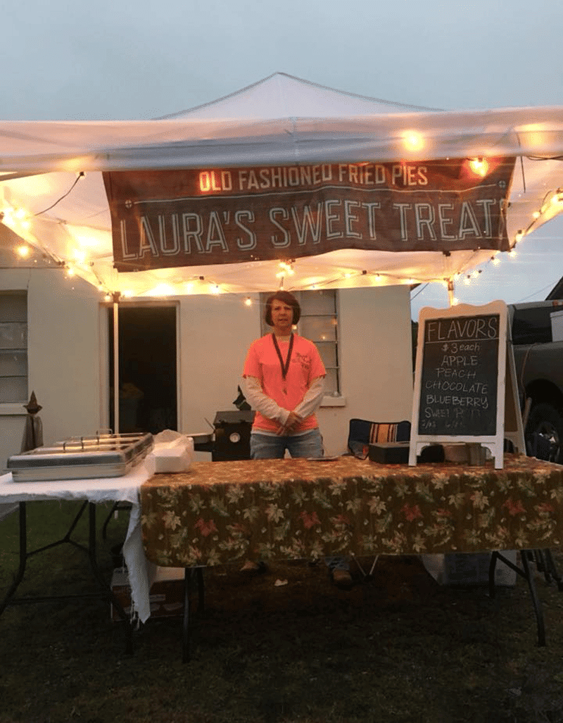 Lauras Sweet Treats Sulligent Alabama Farmers Market Laura Hoppers at vendor booth selling old fashioned fried pies