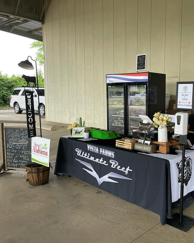 VistaFarmsALFarmersMarket Butler Bees Vernon Abalama Patti Butlerr vendor booth honey homemade products